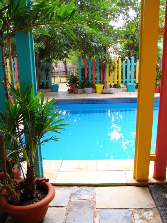 23 Stylish Semi Inground Pool Fence Ideas That Feel Light vibrant playful pool fencing