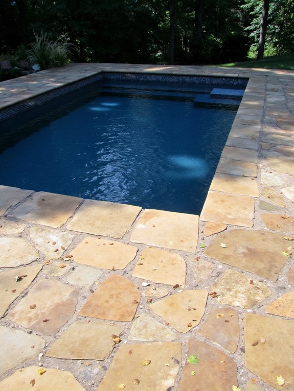 19 Timeless Rectangle Inground Pool Ideas For A Clean Look natural stone pool surrounds