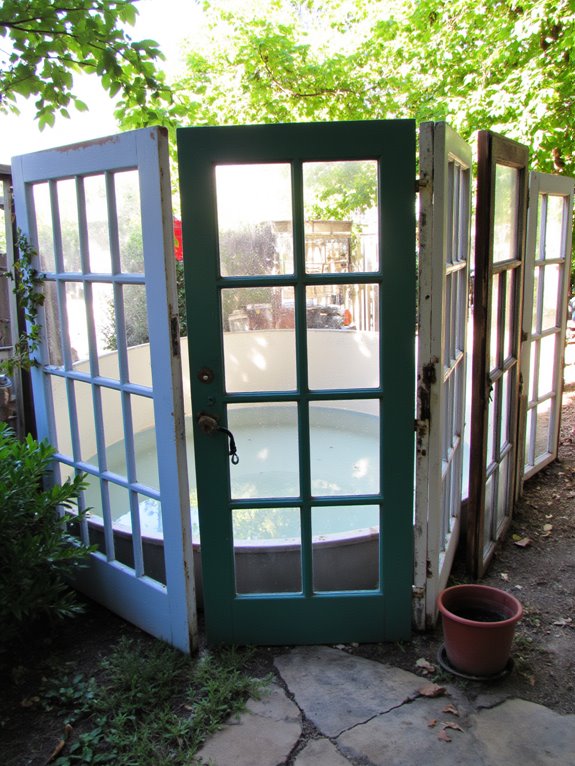 23 Brilliant Stock Tank Pool Privacy Ideas For Peaceful Afternoons repurposed vintage doors screens