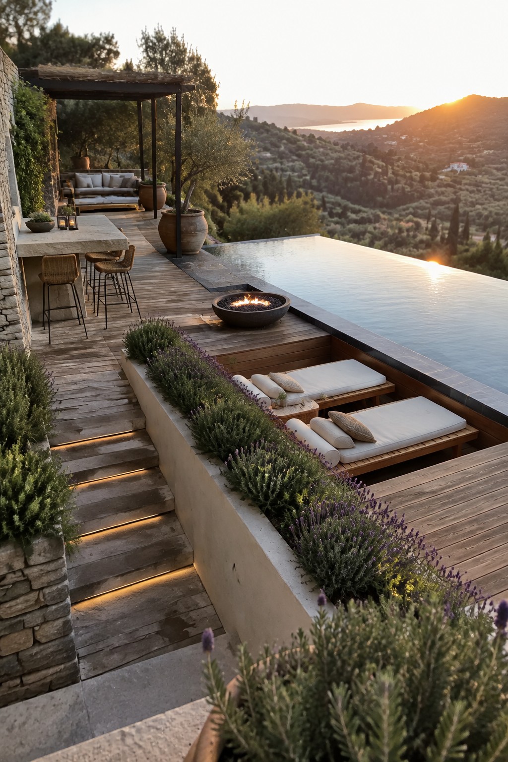 Luxurious wooden deck with infinity pool, fire pit, lounge chairs overlooking sunset hills.